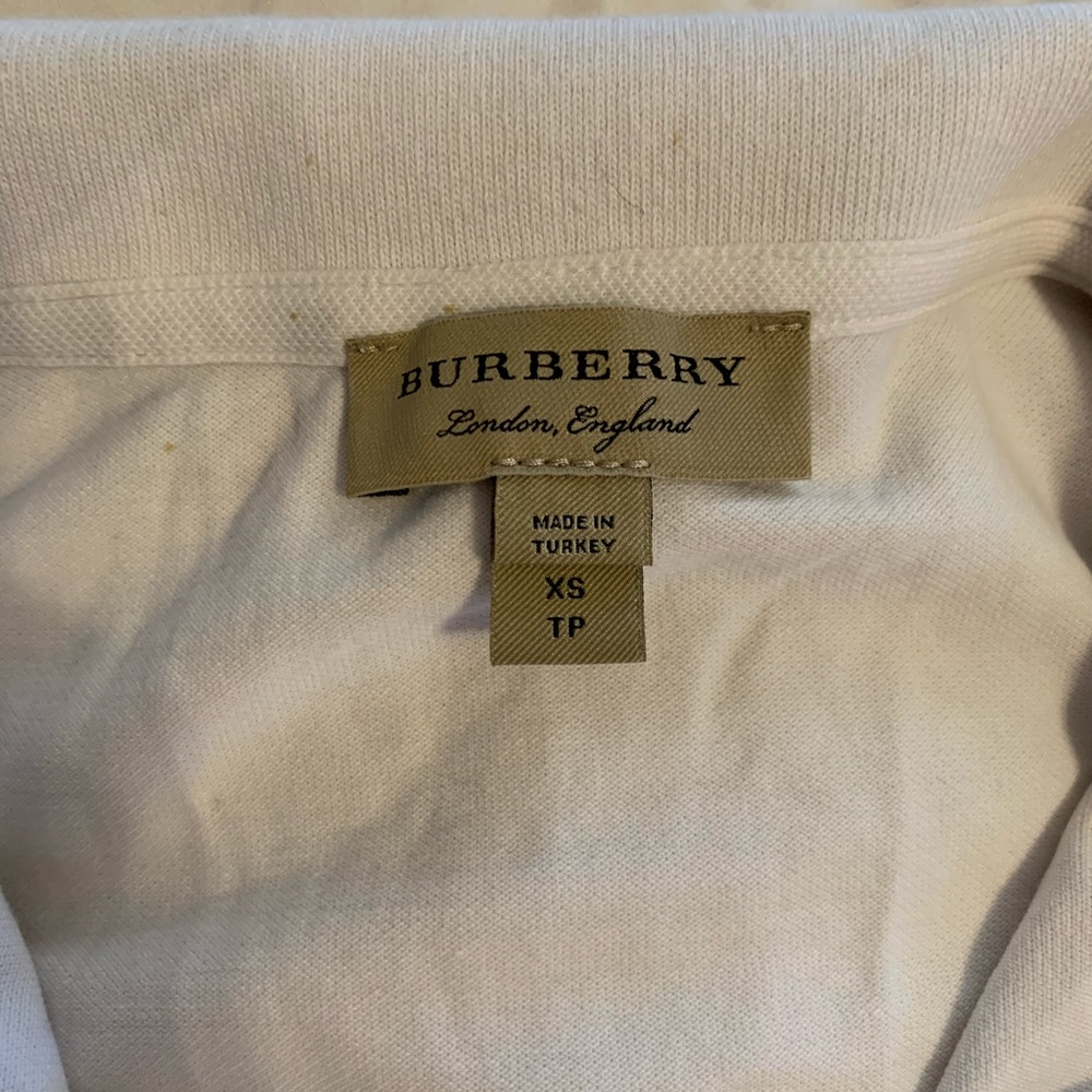 White Polo Shirt.